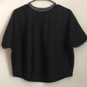 black shirt with striped detailing